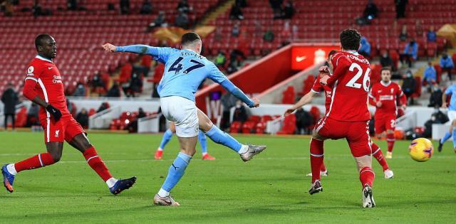 1612742450575003870.jpg 38993362-9228677-Foden_added_gloss_on_the_scoreline_for_City_after_cutting_inside-a-24_1612735738498.jpg